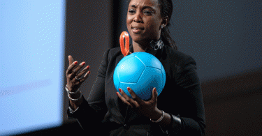 Jessica O Matthews demonstrating the 'Socketball'  (Photo: Nicholas Kamm/AFP/Getty Images)